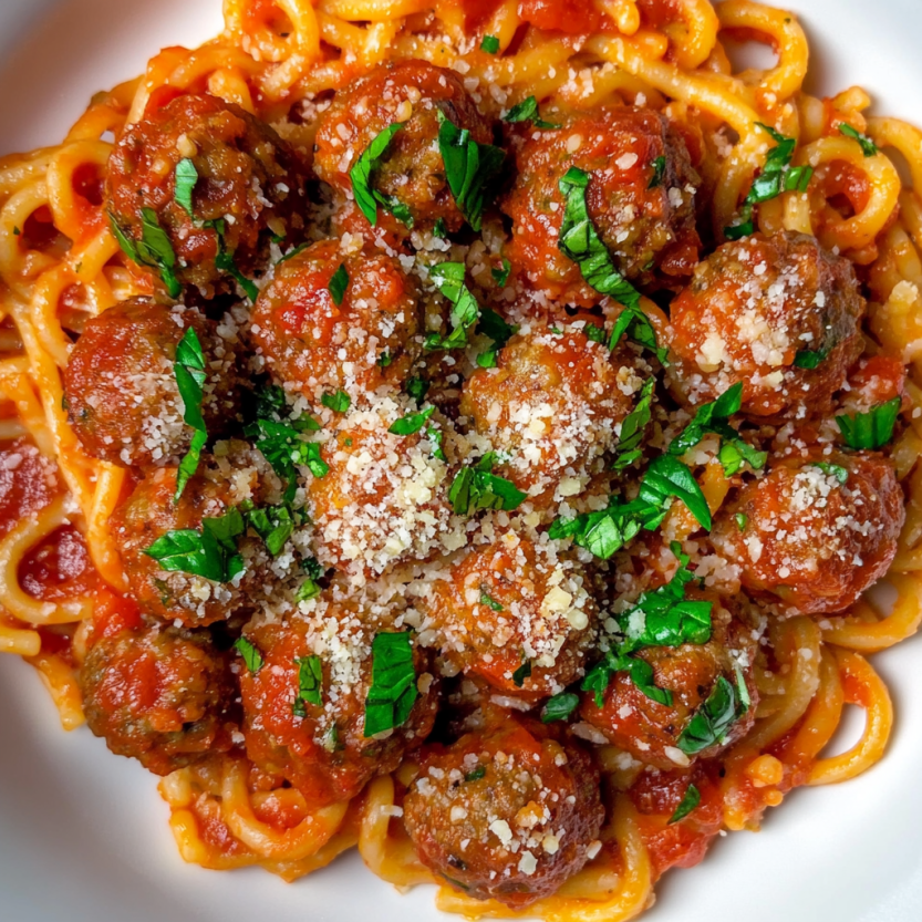 A plate of SpaghettiOs with Mini Meatballs.