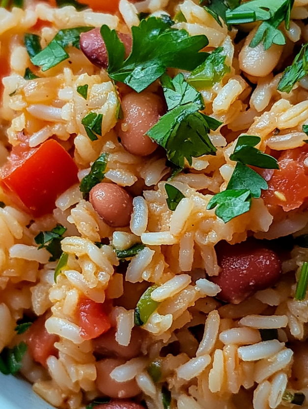 A close up of a dish of rice and beans.