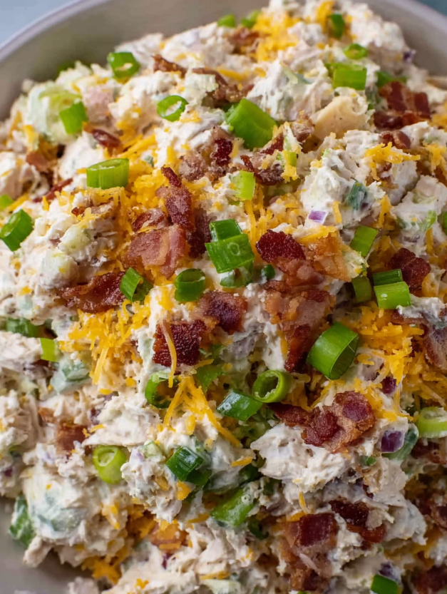 A close up of a delicious bacon ranch chicken salad.
