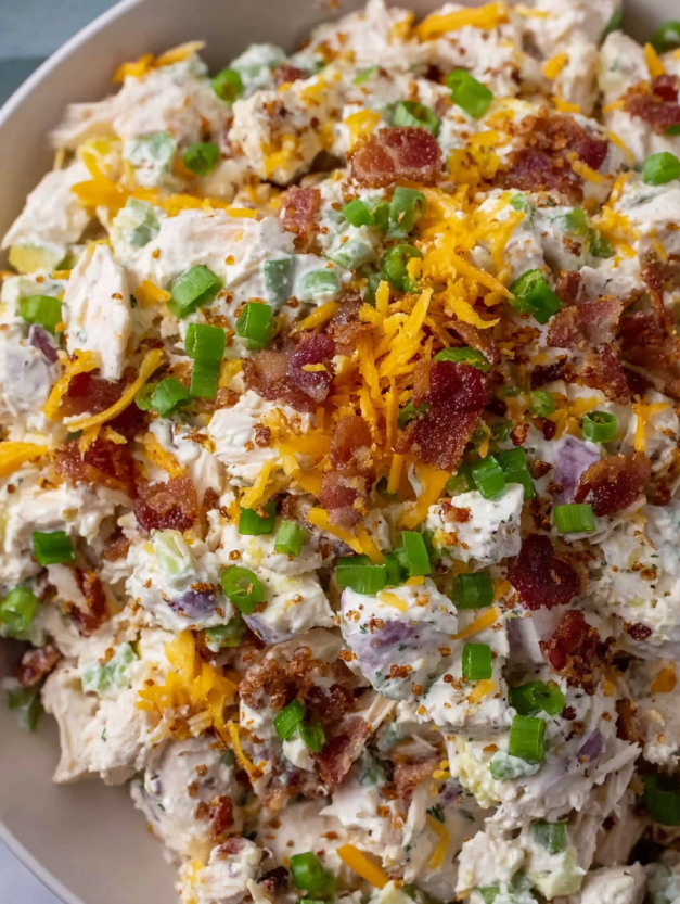 A close up of a delicious bacon ranch chicken salad.