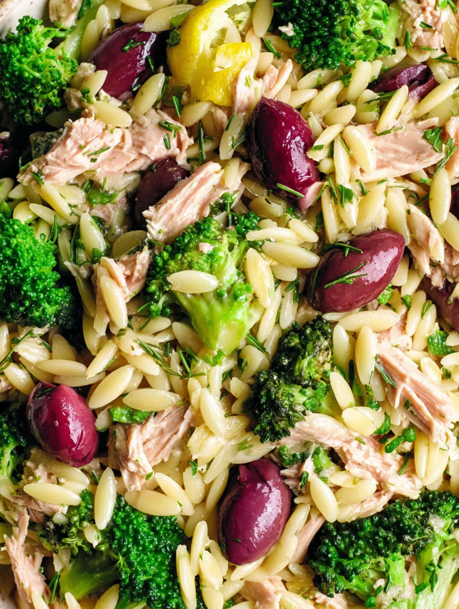A dish of food with rice, broccoli, and tuna.