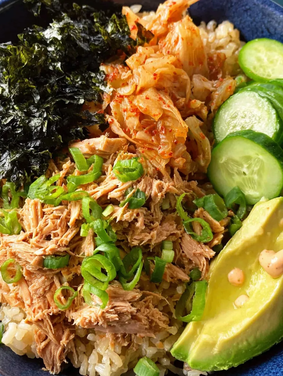 A canned tuna rice bowl with vegetables.
