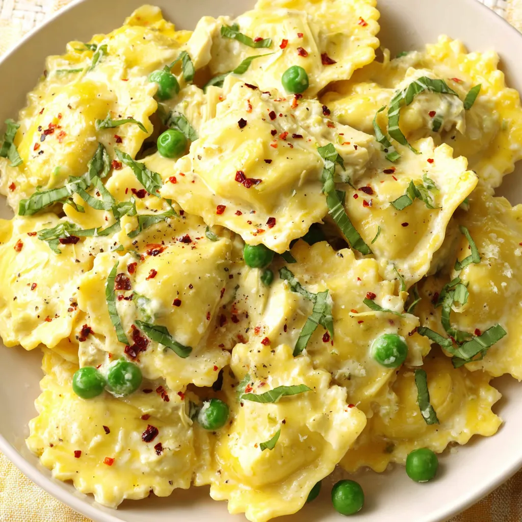 A plate of pasta with peas and artichokes.
