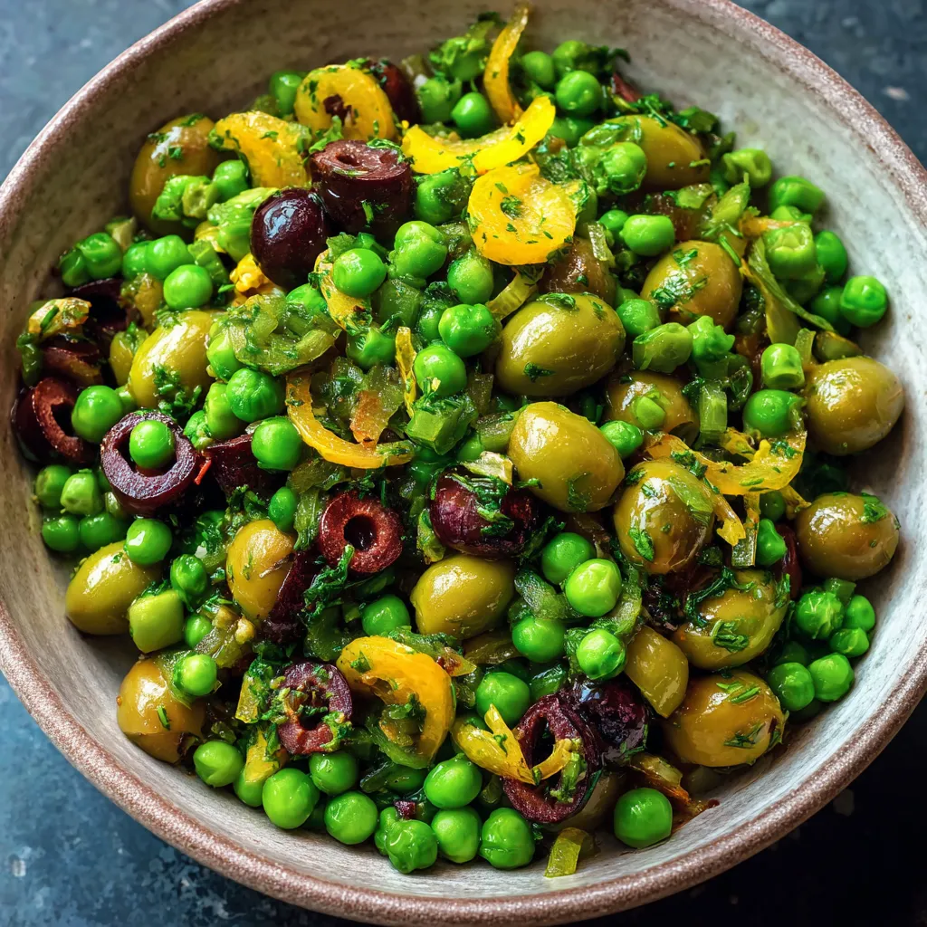 A bowl of pea, olive, and preserved lemon salad.