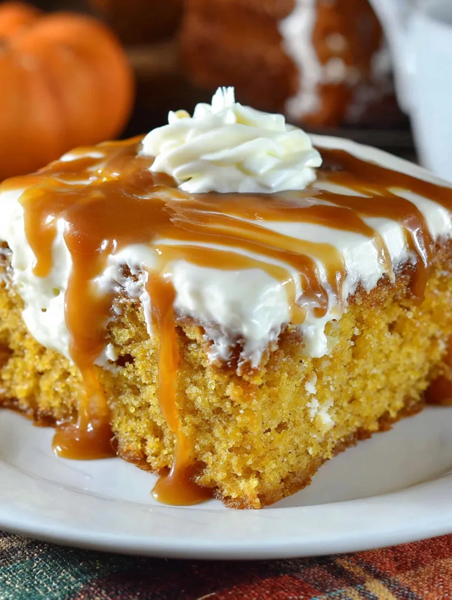 A slice of pumpkin cake with caramel drizzle.