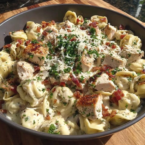 A bowl of Parmesan chicken tortellini.
