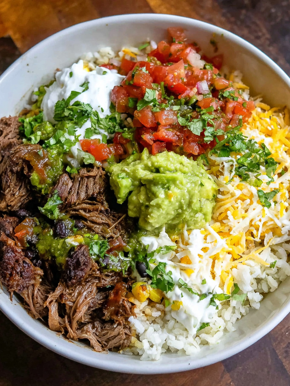 A bowl of food with a variety of ingredients.