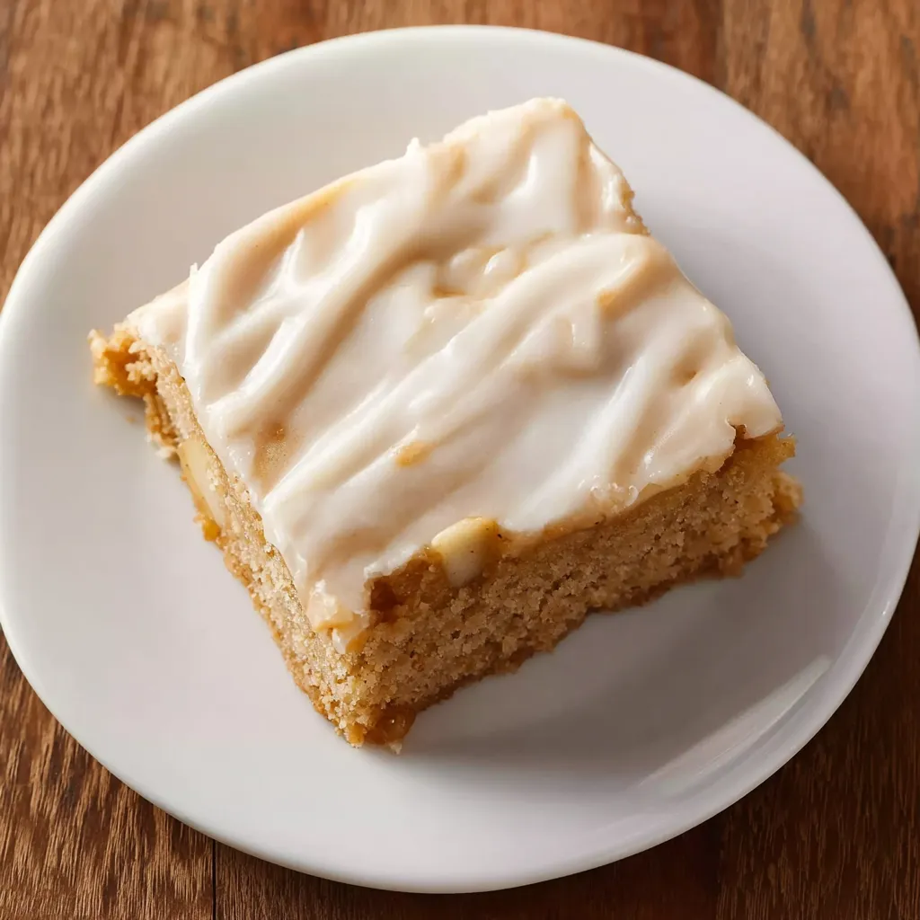 A slice of caramel apple sheet cake.