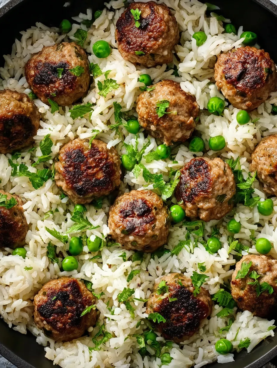 A skillet of meatballs and rice.