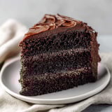 A slice of moist rich chocolate cake.